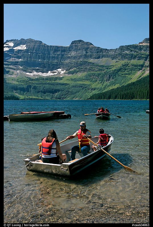 Families boating in Cameron Lake. Waterton Lakes National Park, Alberta, Canada