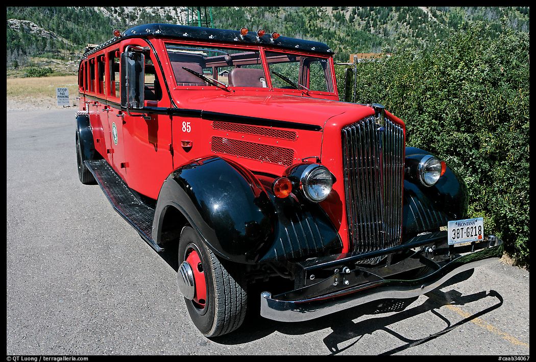 Red antique busses from Glacier National Park. Waterton Lakes National Park, Alberta, Canada