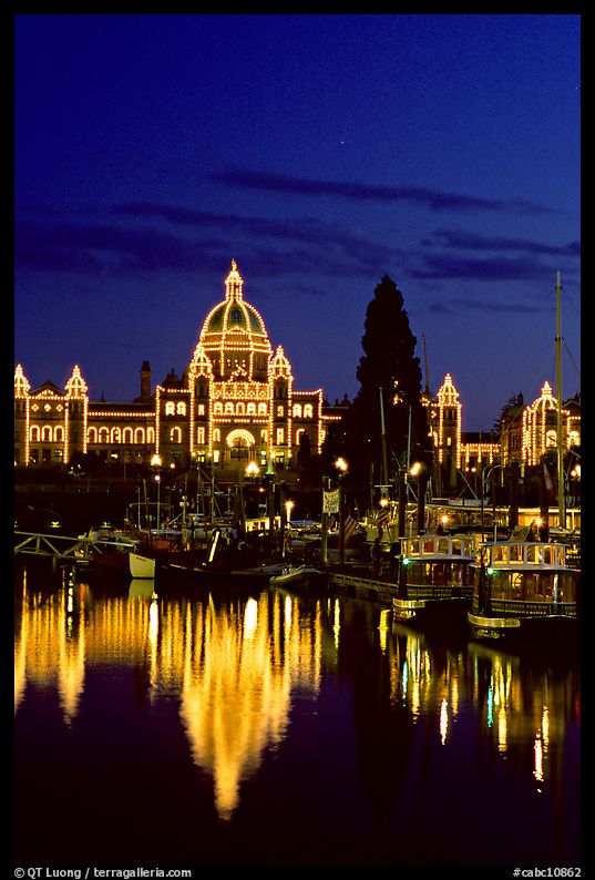 Parliament buildings lights reflected in the harbor. Victoria, British Columbia, Canada