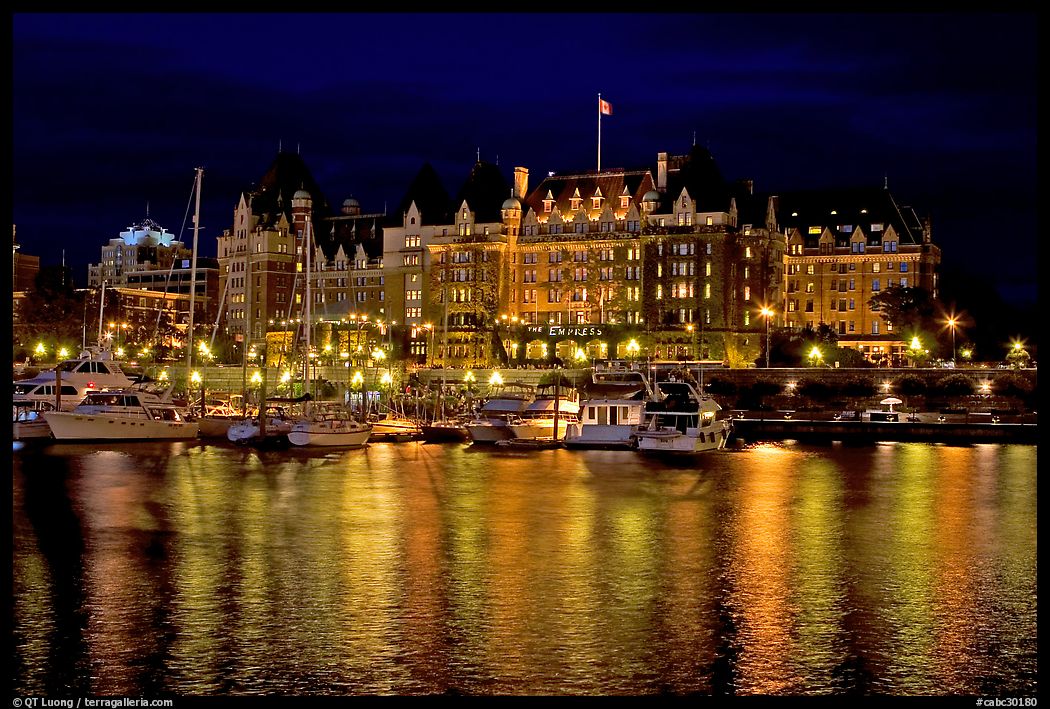 Empress hotel reflected in the Inner Harbour a night. Victoria, British Columbia, Canada