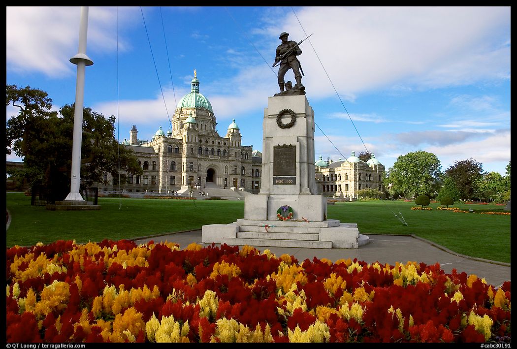 Flowers, memorial, and parliament building. Victoria, British Columbia, Canada