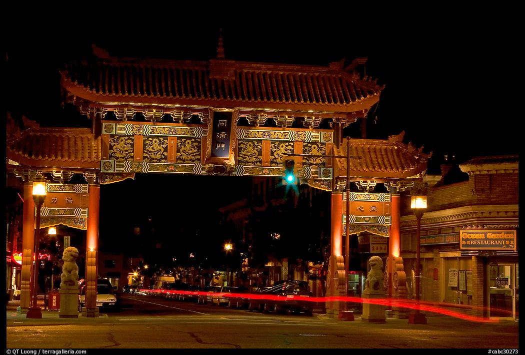 Gate of Harmonious Interest marking the entrance of Chinatown, night. Victoria, British Columbia, Canada