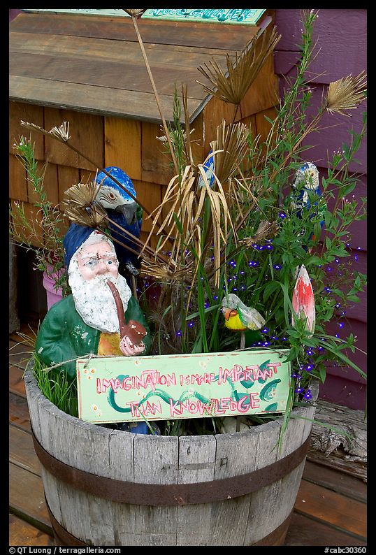 Whimsical basket with motto on houseboat. Victoria, British Columbia, Canada