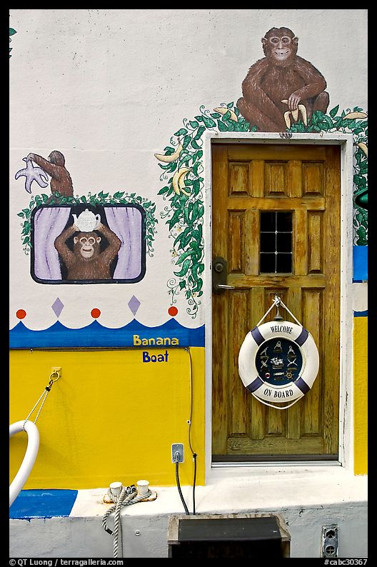 Door of houseboat decorated with a monkey theme. Victoria, British Columbia, Canada