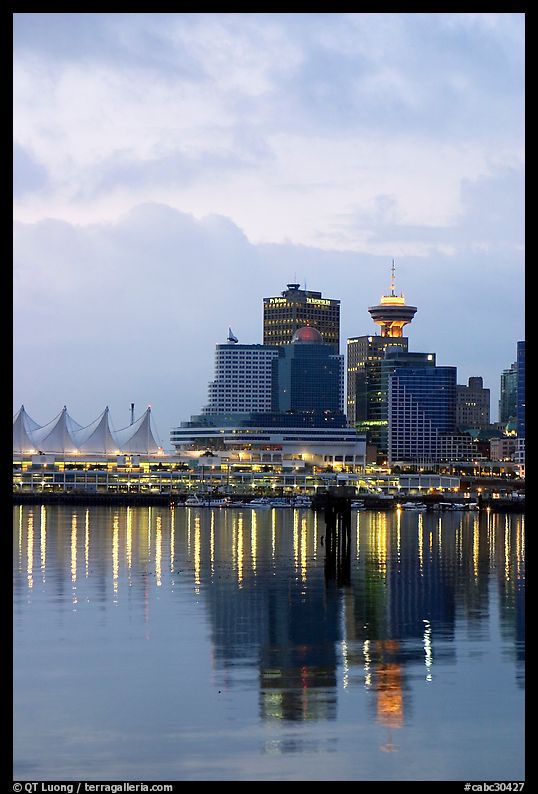 Canada Palace at night and Harbor Center at dawn. Vancouver, British Columbia, Canada