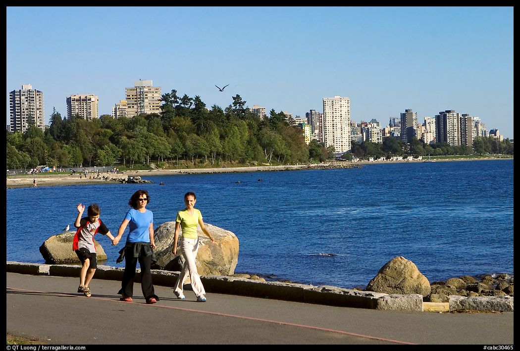 Family walking around Stanley Park. Vancouver, British Columbia, Canada