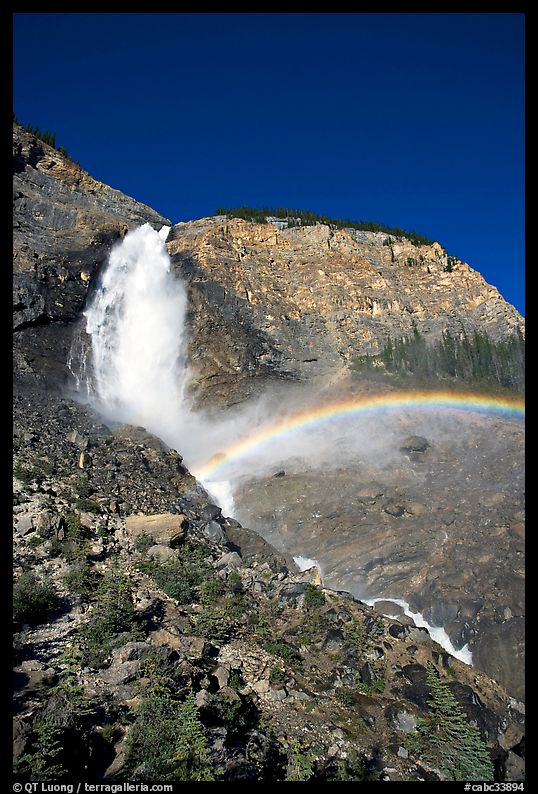Rainbow formed in the mist of Takakkaw Falls. Yoho National Park, Canadian Rockies, British Columbia, Canada