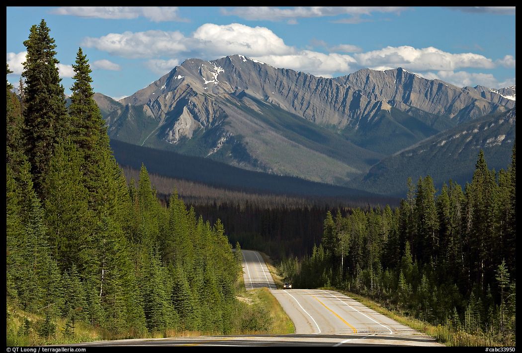 Kootenay Parkway highway and mountains, afternoon. Kootenay National Park, Canadian Rockies, British Columbia, Canada