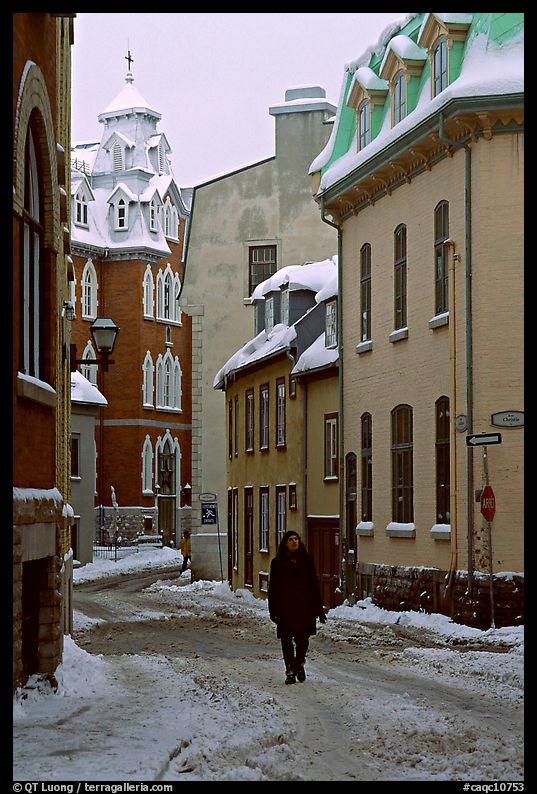 Man walking in a street in winter, Quebec City. Quebec, Canada