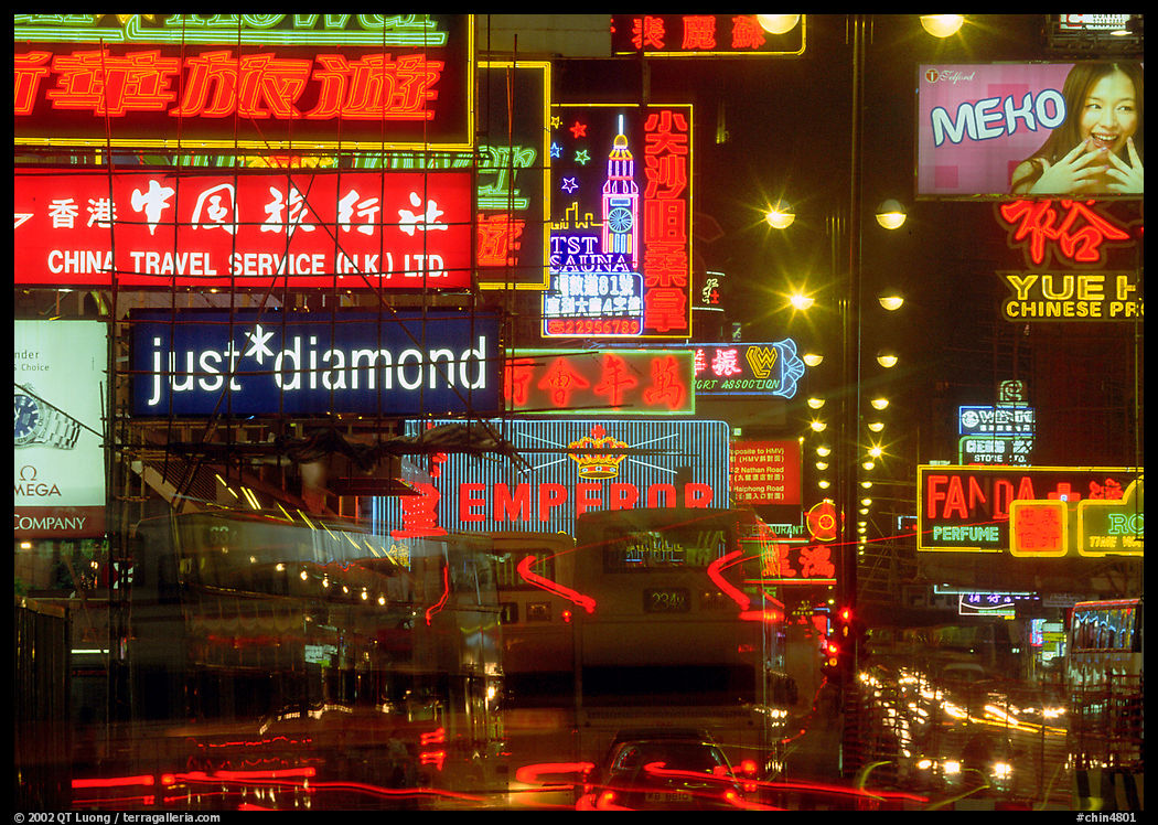 Nathan road, brilliantly lit by neon lights at night, Kowloon. Hong-Kong, China