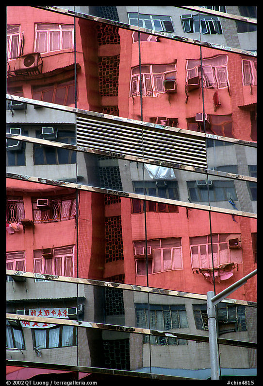 Reflexion in glass building, Kowloon. Hong-Kong, China
