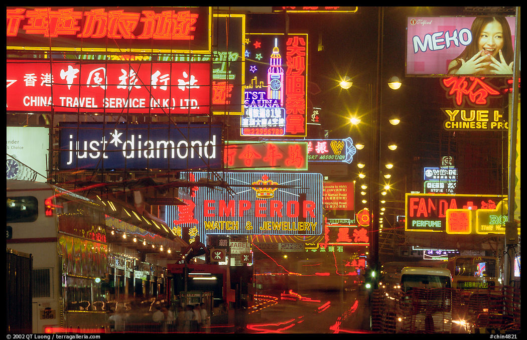 Nathan road, bustling with animation  at night, Kowloon. Hong-Kong, China
