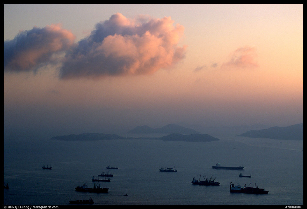 Cargo ships anchored outside of the harbor. Hong-Kong, China