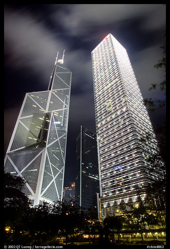 Bank of China (369m) and Cheung Kong Center (290m) buildings at night. Hong-Kong, China