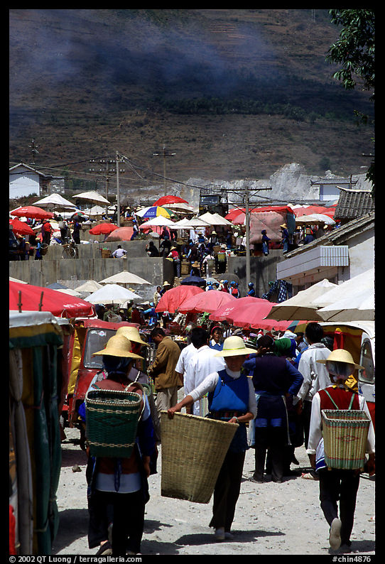 At the periphery of the Monday market frequented by hill tribespeople. Shaping, Yunnan, China