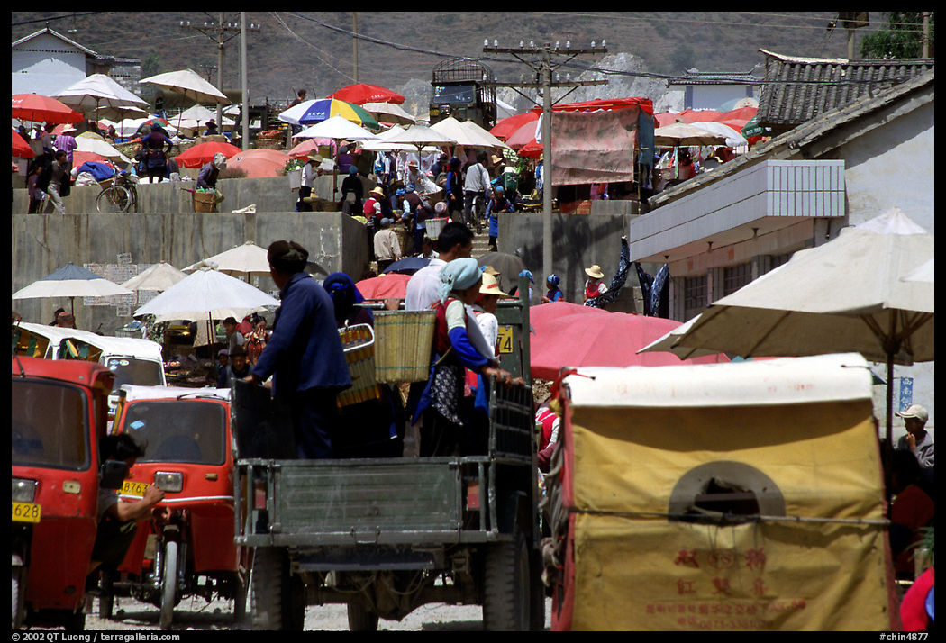 Truck carries villagers to the Monday market. Shaping, Yunnan, China