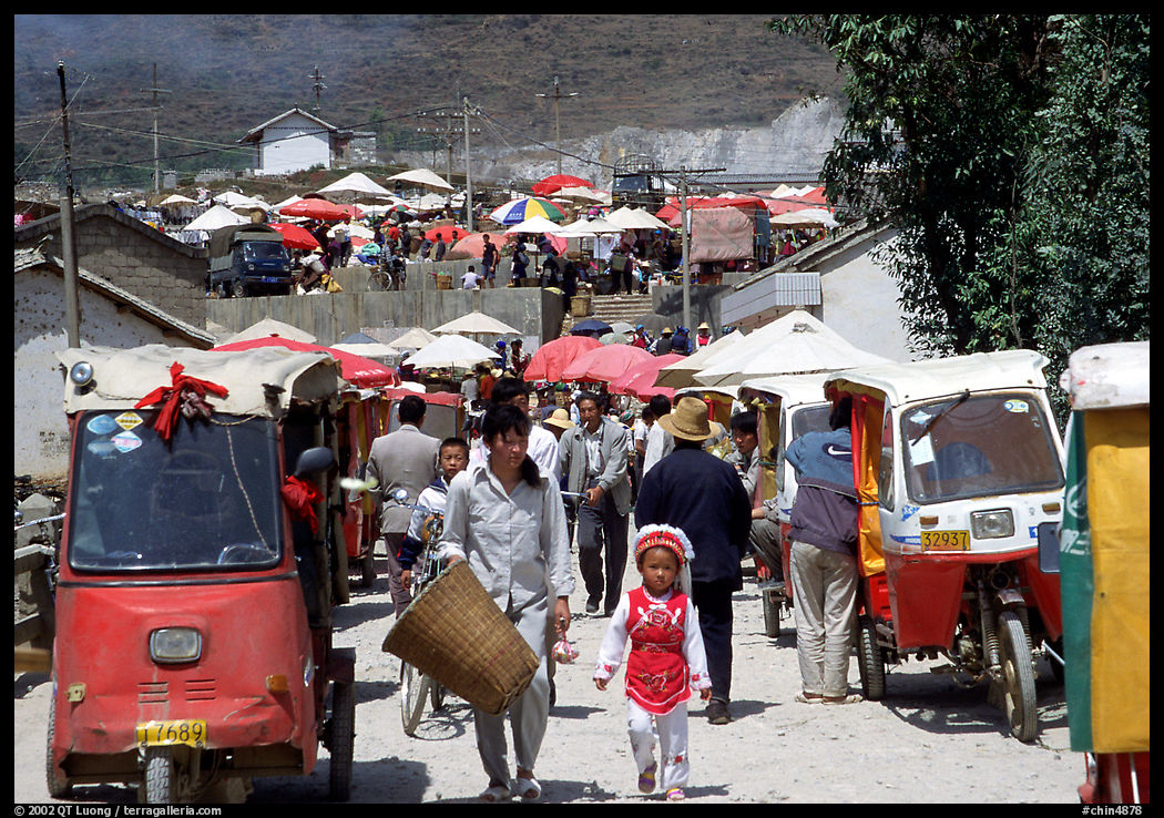 Tuk-tuk waiting for villagers ouside the Monday market. Shaping, Yunnan, China