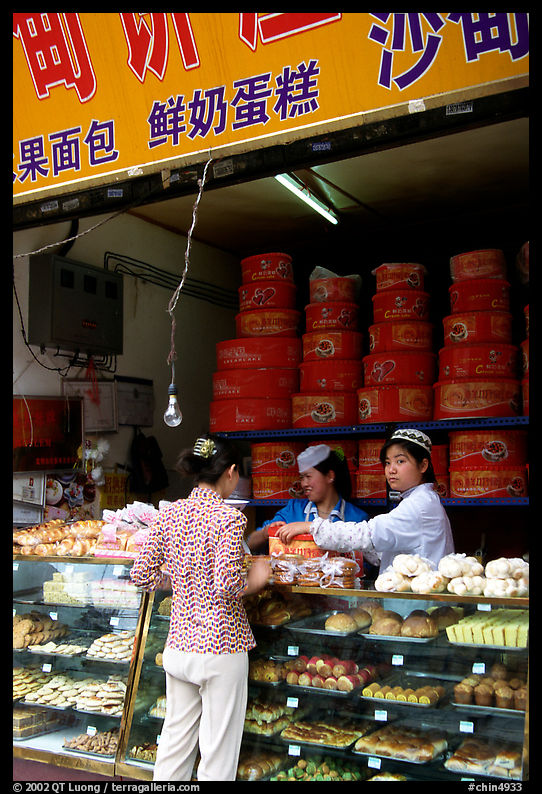 Women at Muslim pastry store. Kunming, Yunnan, China