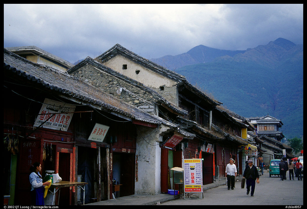 Old houses and Cang Shan mountains. Dali, Yunnan, China