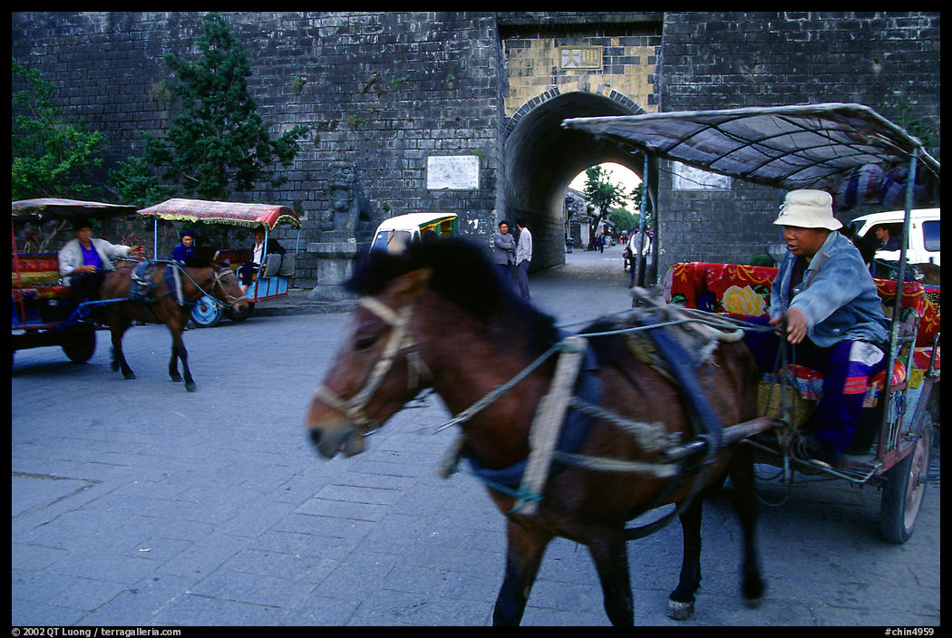 Horse carriage near the North Gate. Dali, Yunnan, China