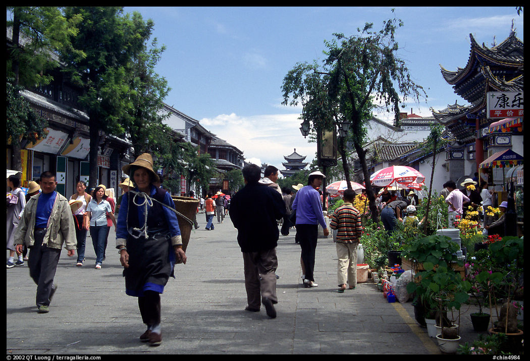 On one of the recently enlarged pedestrian streets. Dali, Yunnan, China