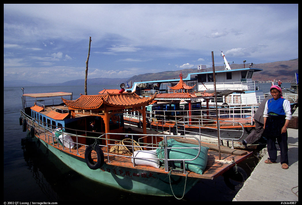 Boats on a pier of Erhai Lake. Dali, Yunnan, China