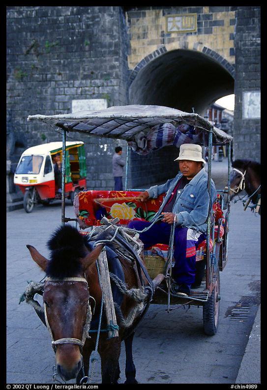Horse carriage next to the North gate. Dali, Yunnan, China