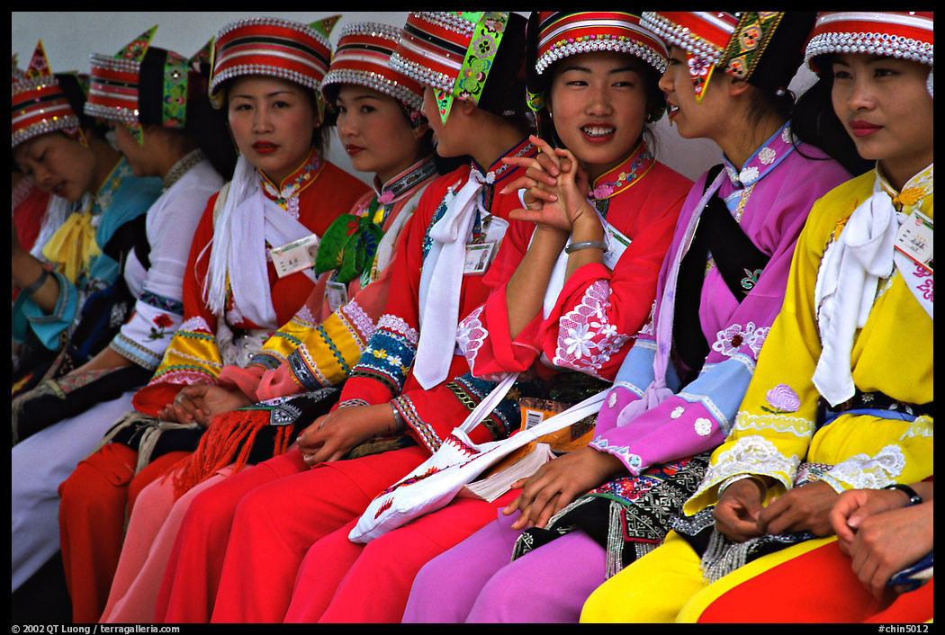 Tour guides dressed with traditional Sani outfits. Shilin, Yunnan, China