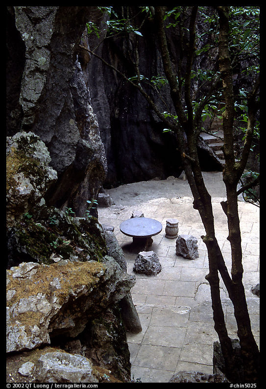 Quiet courtyard between limestone pillars. Shilin, Yunnan, China