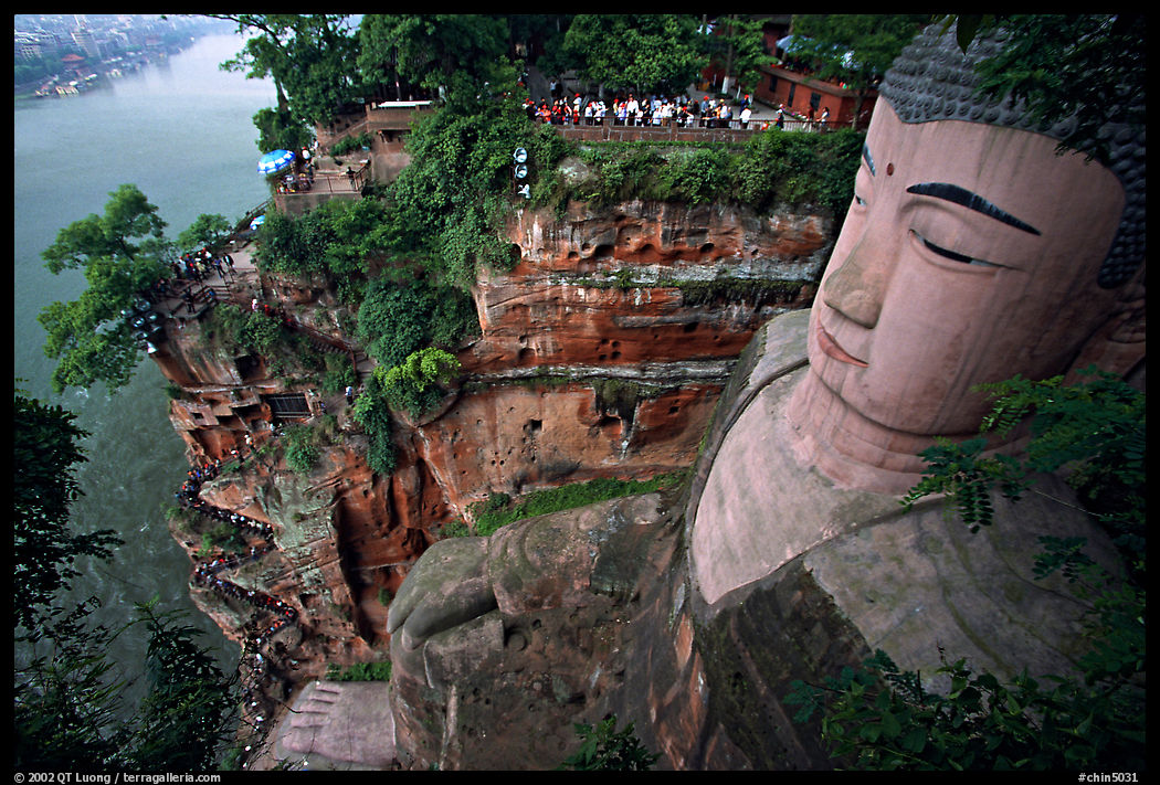 Da Fo (Grand Buddha) with staircase in cliffside and river in the background. Leshan, Sichuan, China