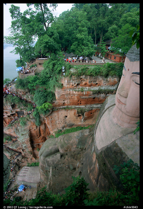 Da Fo (Grand Buddha) with staircase in cliffside and river in the background. Leshan, Sichuan, China