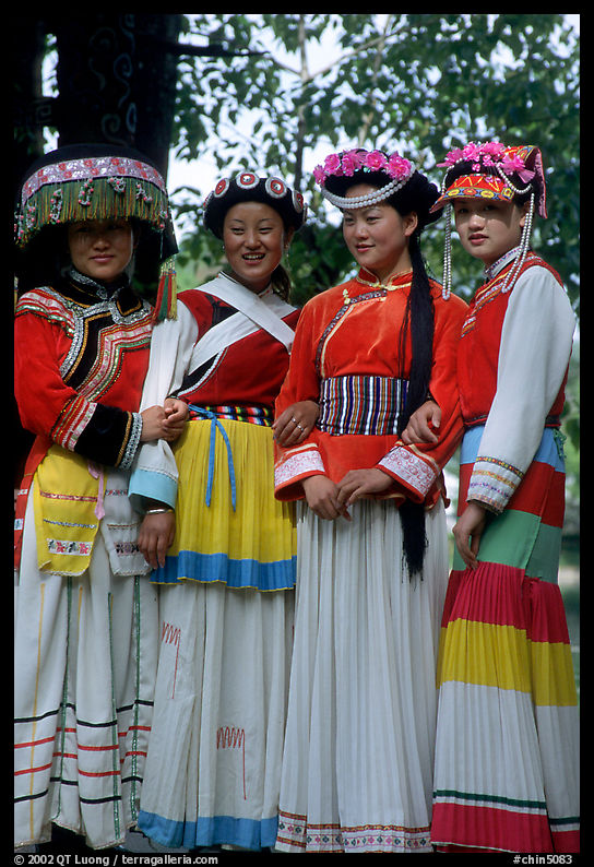 Women wearing Naxi dress. Lijiang, Yunnan, China