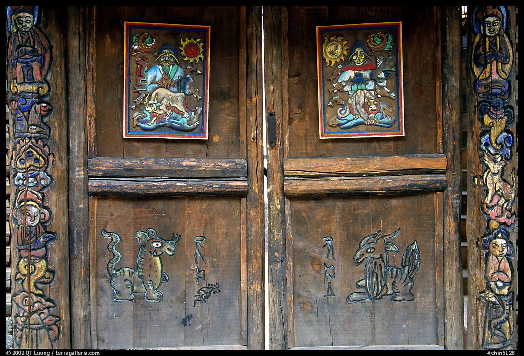 Decorated doors of a temple. Lijiang, Yunnan, China