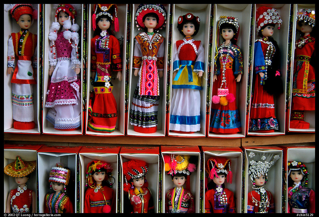 Dolls wearing traditional Bai dress. Lijiang, Yunnan, China