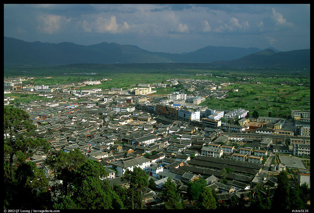 Old town, new town, and surrounding fields seen from Wangu tower. Lijiang, Yunnan, China