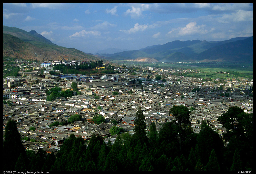 Old town, new town, and surrounding fields seen from Wangu tower. Lijiang, Yunnan, China