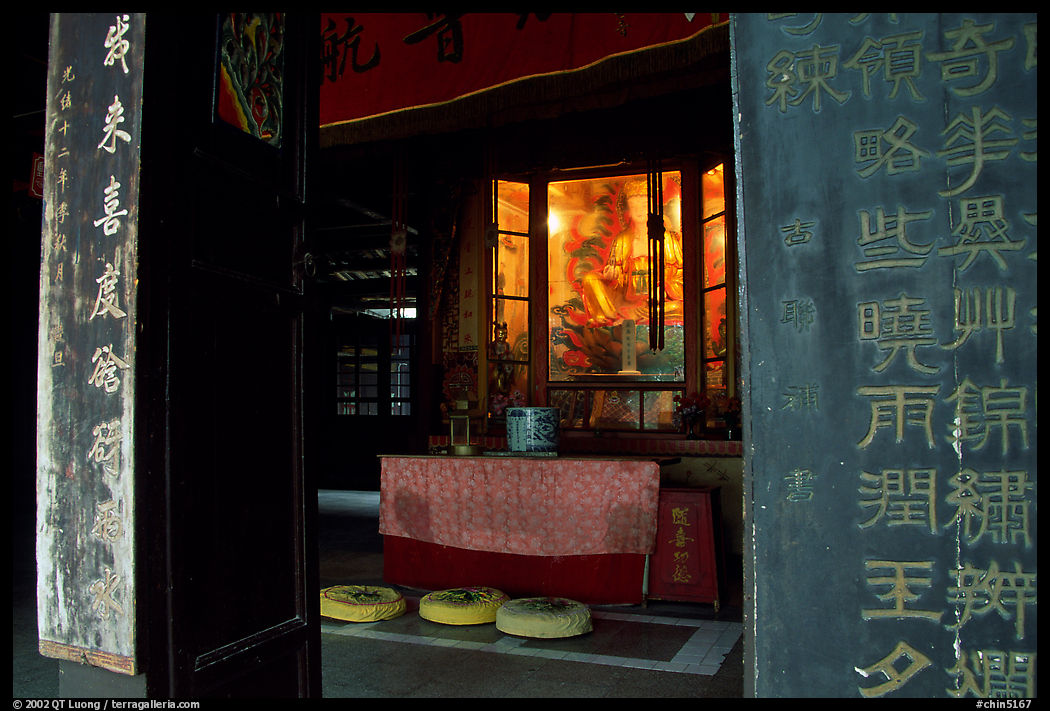 Buddha image and altar in Hongchunping temple. Emei Shan, Sichuan, China