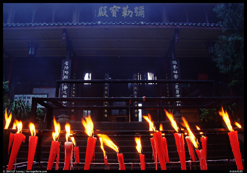 Candles burning in front of Wannian Si temple. Emei Shan, Sichuan, China