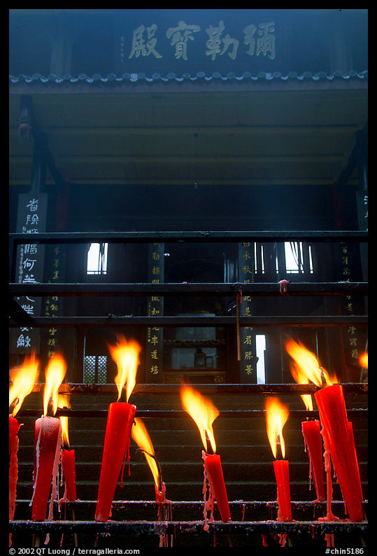 Candles burning in front of Wannian Si temple. Emei Shan, Sichuan, China