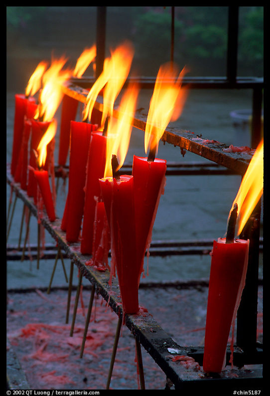 Candles burning. Emei Shan, Sichuan, China