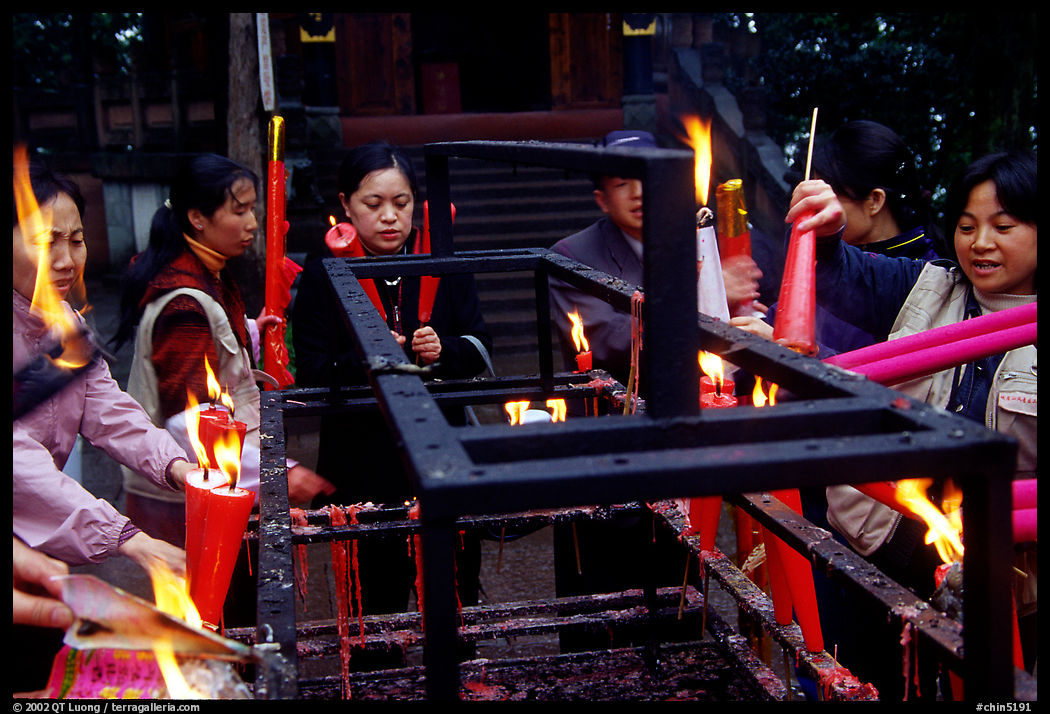 Pilgrims burning big incense batons. Emei Shan, Sichuan, China
