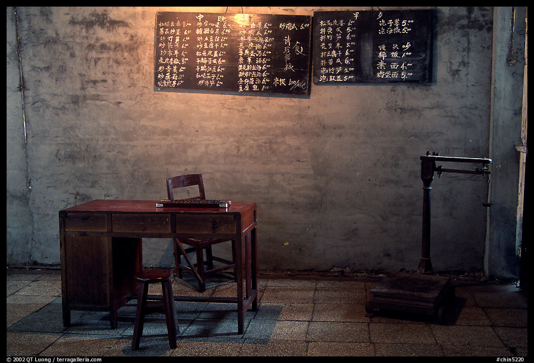 Desk with counting frame, blackboard with Chinese script, scale. Emei Shan, Sichuan, China