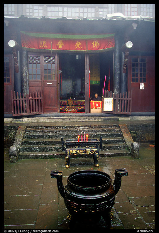 Urn in courtyard inside Xixiangchi temple. Emei Shan, Sichuan, China