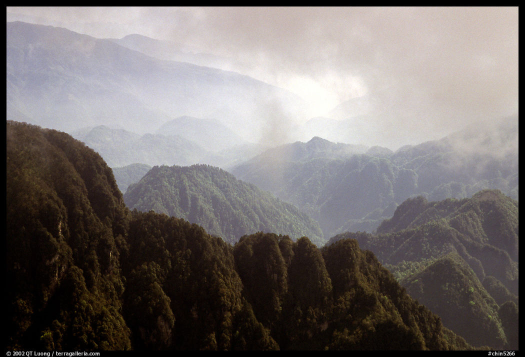 Forest-covered slopes and ridges of Emei Shan. Emei Shan, Sichuan, China