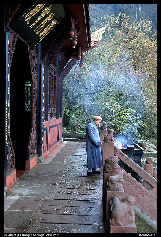 Monk in front of Jieyin Palace. Emei Shan, Sichuan, China
