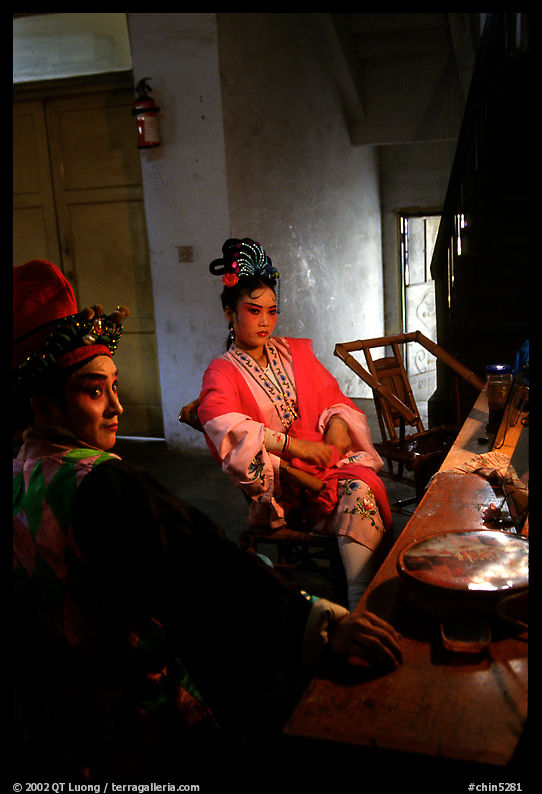 Sichuan opera actors getting ready in the backstage before the performance. Chengdu, Sichuan, China