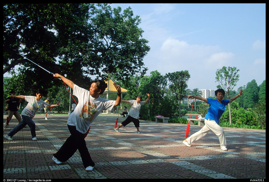 Collective exercise gymnastics with swords,  Liuha Park. Guangzhou, Guangdong, China