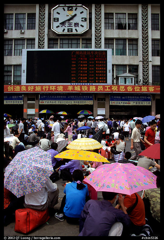 Crowds waiting outside the main train station. Guangzhou, Guangdong, China
