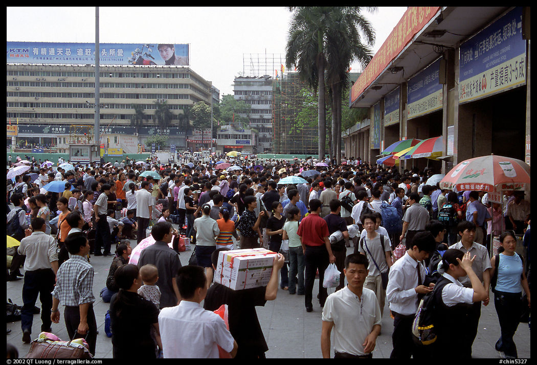 Crowds waiting outside the main train station. Guangzhou, Guangdong, China