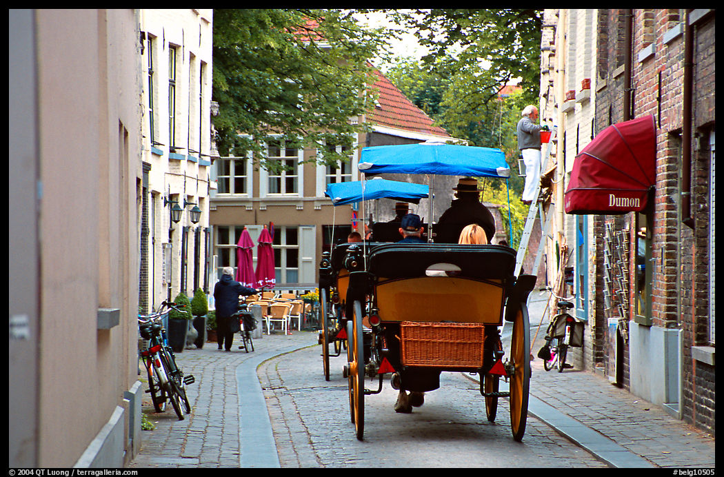 Horse carriage in a narrow street. Bruges, Belgium